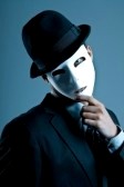 4357525-young-man-wearing-a-suit-and-a-white-mask